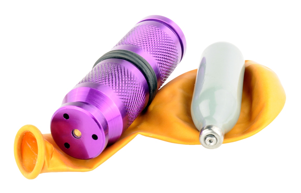 A nitrous oxide cannister and balloon
