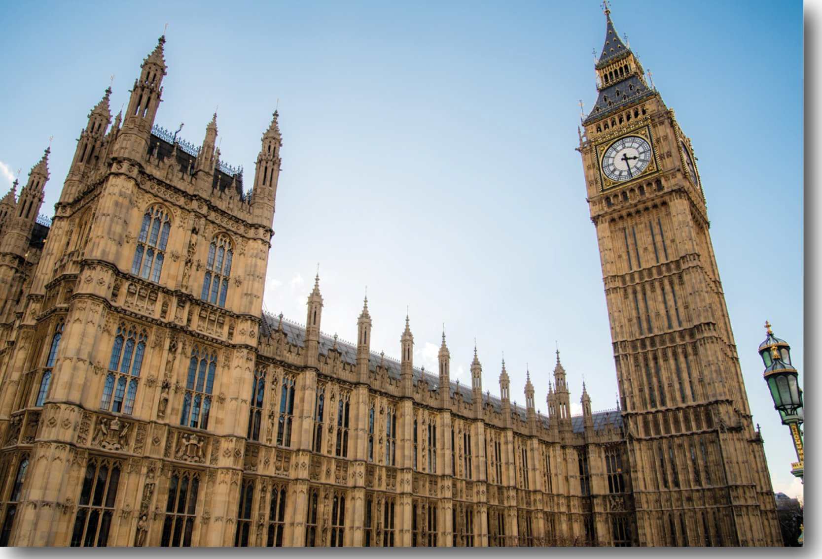 Pictured is an image of parliament with blue skies in the background